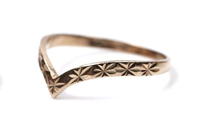 Lot 64 - Four 9ct gold rings, including a wishbone ring