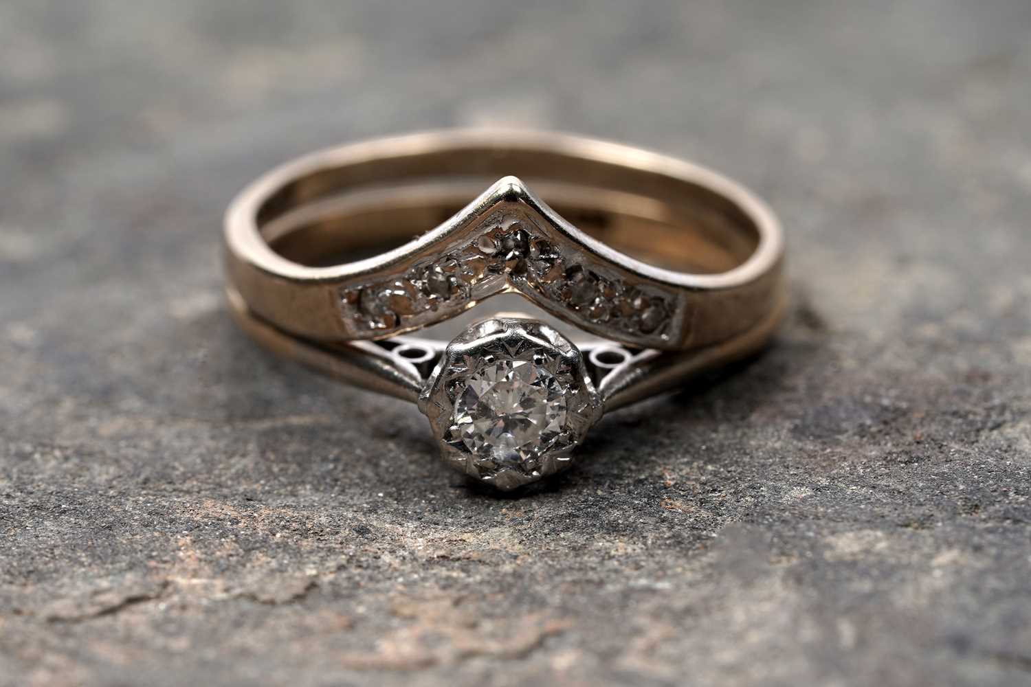 Lot 65 - An early 20th Century single-stone diamond ring; and a wishbone pattern ring