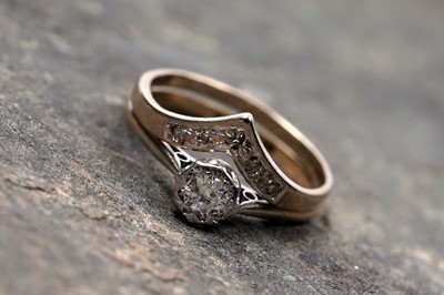 Lot 65 - An early 20th Century single-stone diamond ring; and a wishbone pattern ring