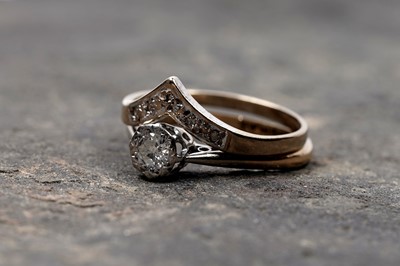 Lot 65 - An early 20th Century single-stone diamond ring; and a wishbone pattern ring