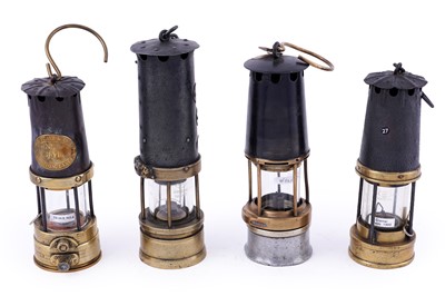 Lot 366 - A collection of miner's lamps