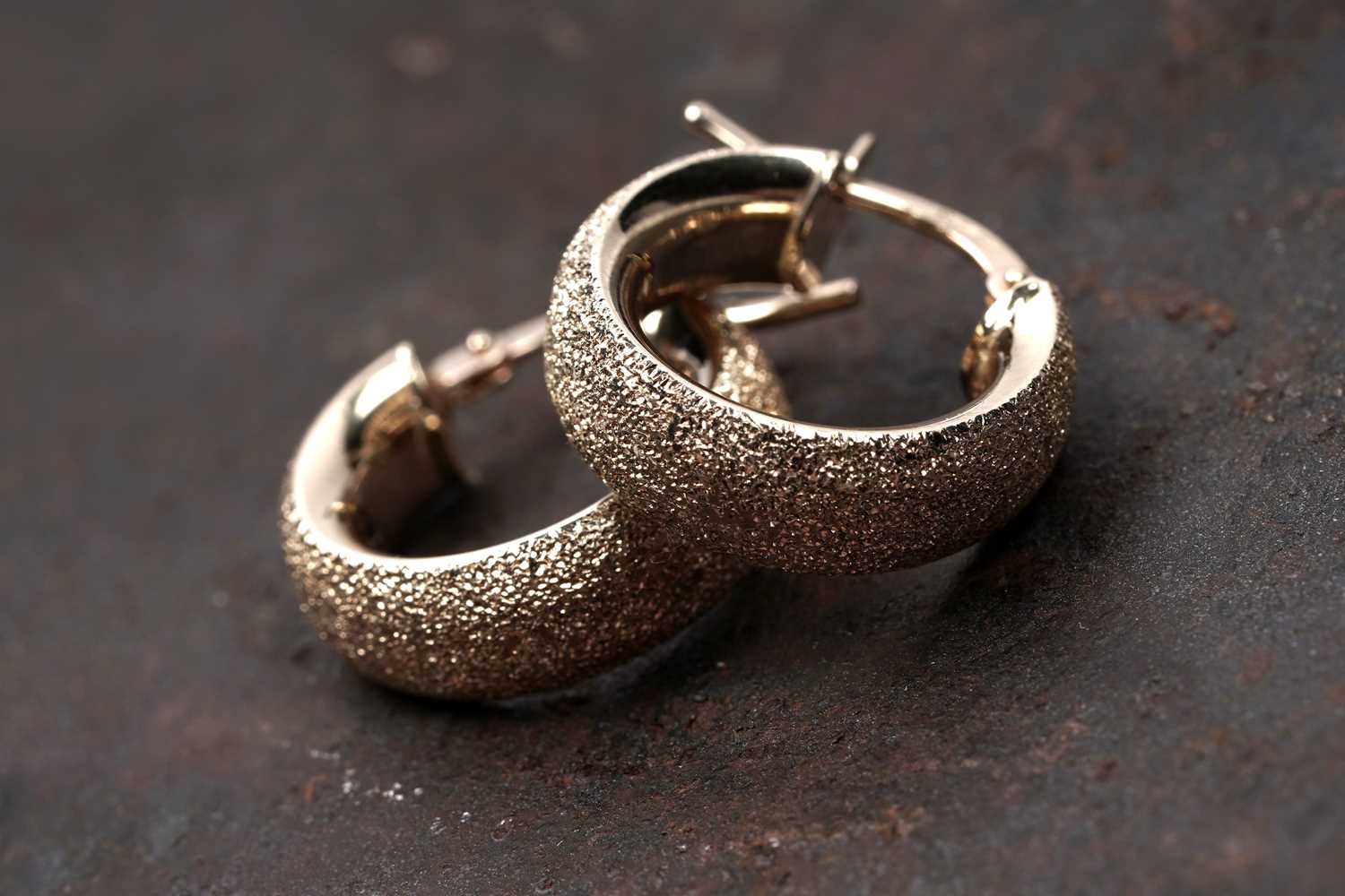 Lot 66 - A pair of Italian 9ct gold hoop earrings