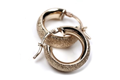 Lot 66 - A pair of Italian 9ct gold hoop earrings