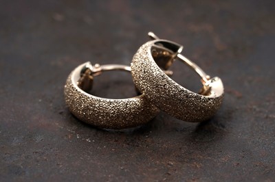 Lot 66 - A pair of Italian 9ct gold hoop earrings