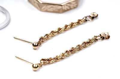 Lot 67 - Three pairs of gold hoop earrings