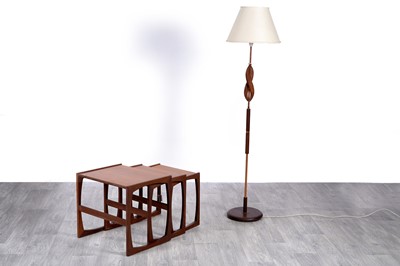 Lot 111 - A ‘Quadrille’ nest of three teak tables; and a mid-Century teak and copper standard lamp