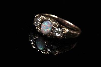 Lot 90 - An early 20th Century opal and diamond ring | c.1920s