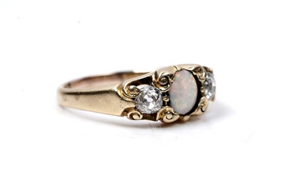 Lot 90 - An early 20th Century opal and diamond ring | c.1920s