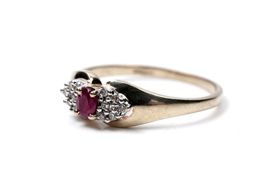 Lot 93 - A ruby and diamond bow pattern ring