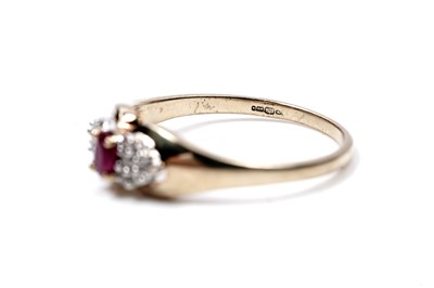 Lot 93 - A ruby and diamond bow pattern ring