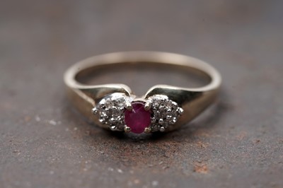 Lot 93 - A ruby and diamond bow pattern ring