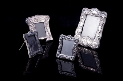 Lot 174 - Four Elizabeth II Victorian Revival silver photograph frames