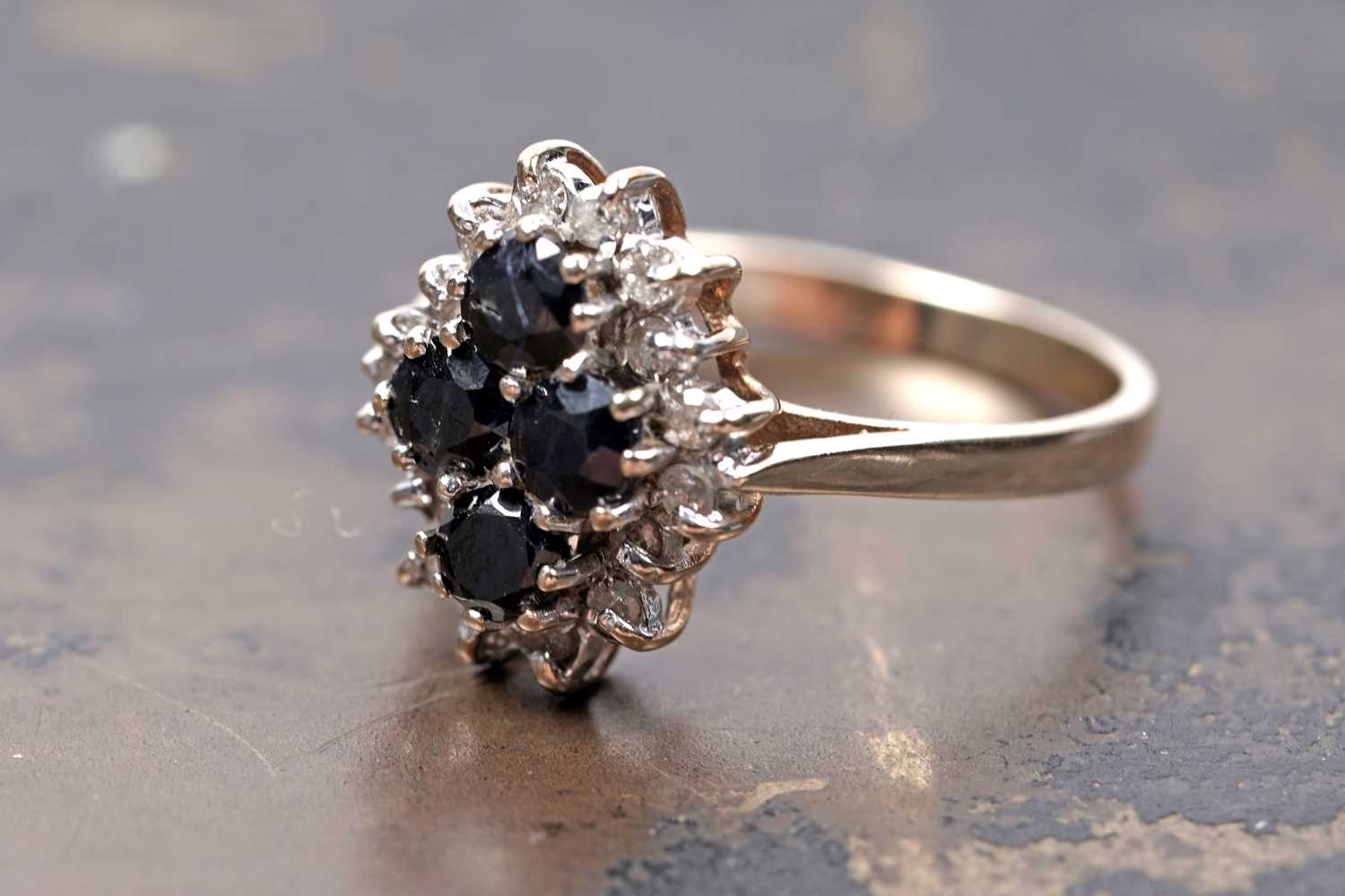 Lot 96 - A sapphire and diamond ring