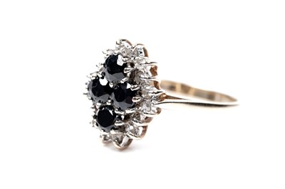 Lot 96 - A sapphire and diamond ring