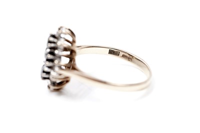 Lot 96 - A sapphire and diamond ring
