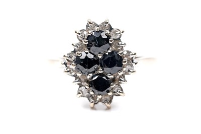 Lot 96 - A sapphire and diamond ring