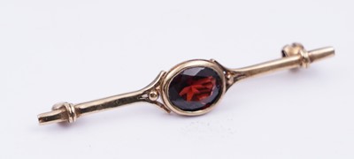 Lot 99 - Edwardian and later brooches; and a ring