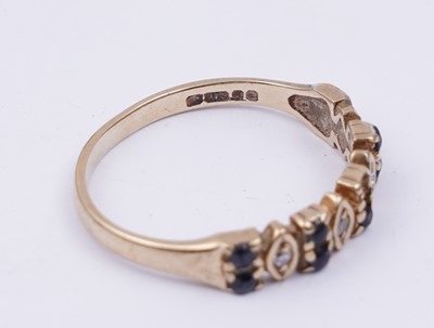Lot 99 - Edwardian and later brooches; and a ring