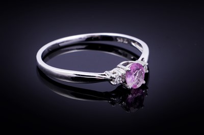 Lot 73 - A pink sapphire and diamond ring