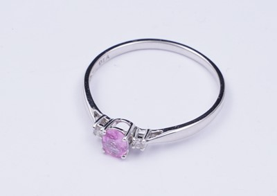 Lot 73 - A pink sapphire and diamond ring