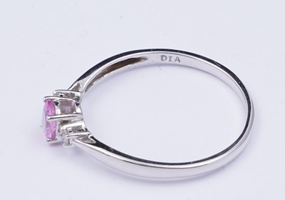 Lot 73 - A pink sapphire and diamond ring