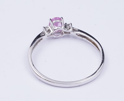 Lot 73 - A pink sapphire and diamond ring