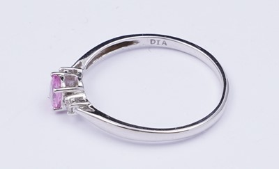 Lot 73 - A pink sapphire and diamond ring