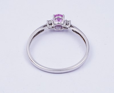 Lot 73 - A pink sapphire and diamond ring