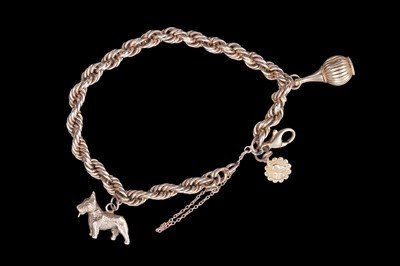 Lot 32 - A gold rope-twist charm bracelet