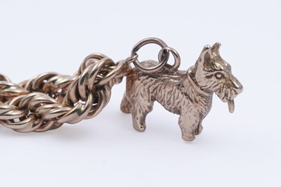 Lot 32 - A gold rope-twist charm bracelet