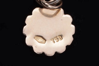 Lot 32 - A gold rope-twist charm bracelet