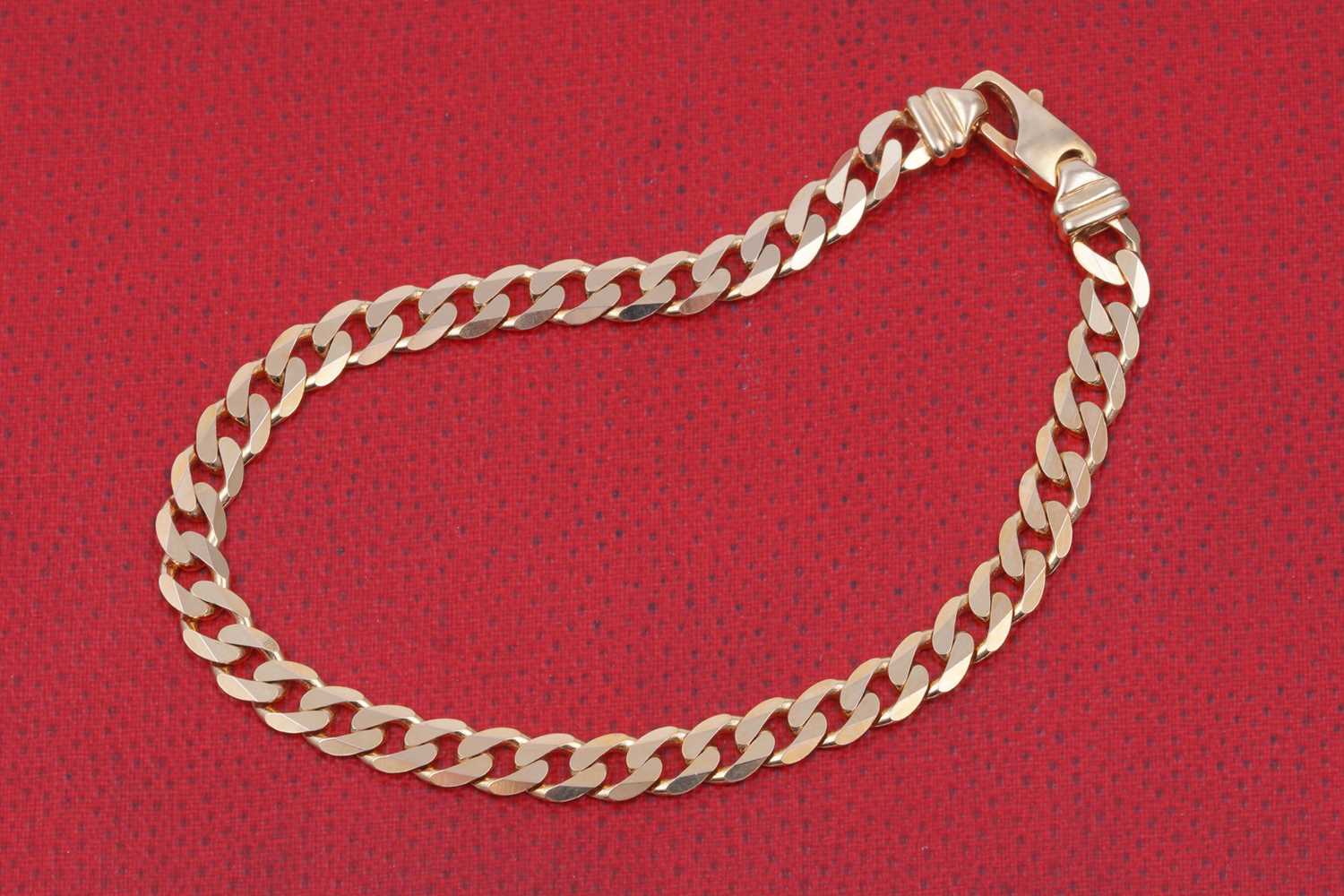 Lot 35 - A 9ct gold flat curb-link bracelet