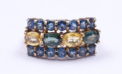 Lot 37 - A topaz and citrine dress ring