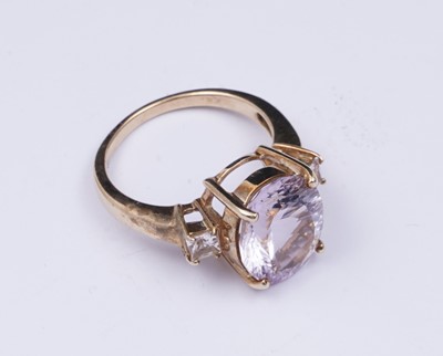 Lot 38 - An amethyst and goshenite dress ring