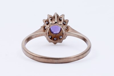 Lot 39 - A contemporary amethyst and diamond ring