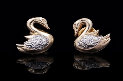 Lot 41 - A pair of swan pattern earrings set with diamonds