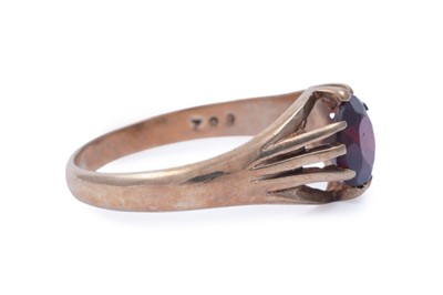 Lot 42 - A red tourmaline love heart ring; and a garnet ring