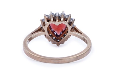 Lot 42 - A red tourmaline love heart ring; and a garnet ring