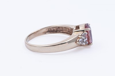 Lot 45 - Three gemstone rings, including a morganite and goshenite three stone ring