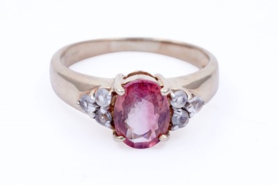 Lot 45 - Three gemstone rings, including a morganite and goshenite three stone ring