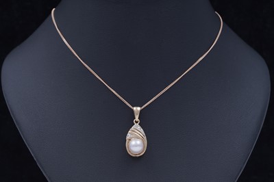 Lot 46 - A cultured pearl and diamond pendant necklace