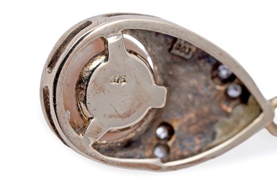 Lot 46 - A cultured pearl and diamond pendant necklace