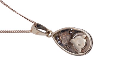 Lot 46 - A cultured pearl and diamond pendant necklace