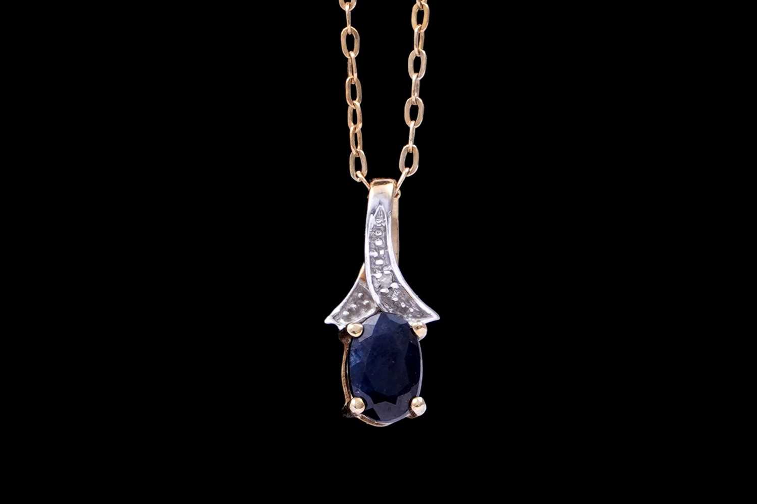 Lot 48 - A sapphire and diamond pendant necklace