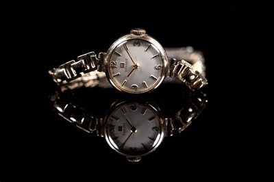 Lot 117 - A lady's 9ct gold cased Tissot wristwatch