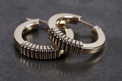 Lot 15 - A pair of 18ct gold hoop earrings
