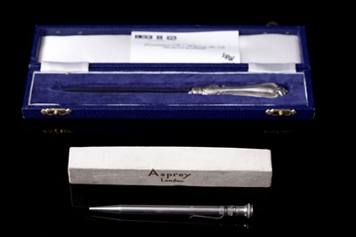 Lot 191 - An Asprey silver propelling pencil; and a silver handled letter knife