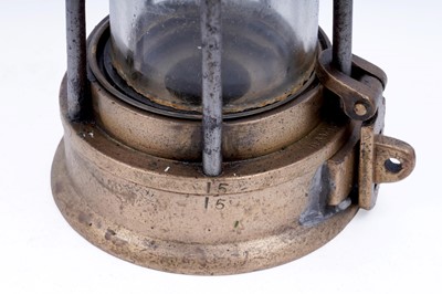 Lot 197 - A collection of four ‘Protector’ type lamps