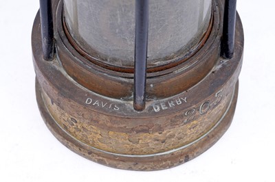 Lot 197 - A collection of four ‘Protector’ type lamps