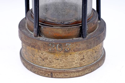 Lot 197 - A collection of four ‘Protector’ type lamps